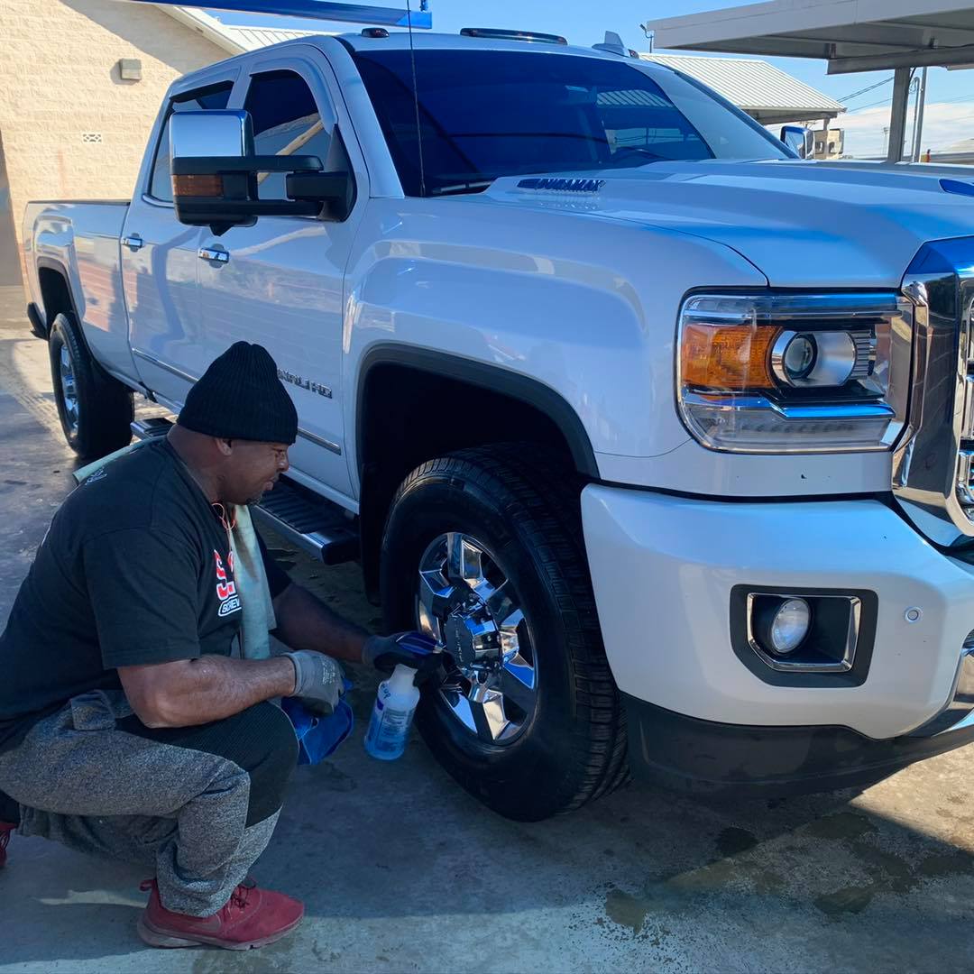 Sudz Car Wash cleaning truck rims