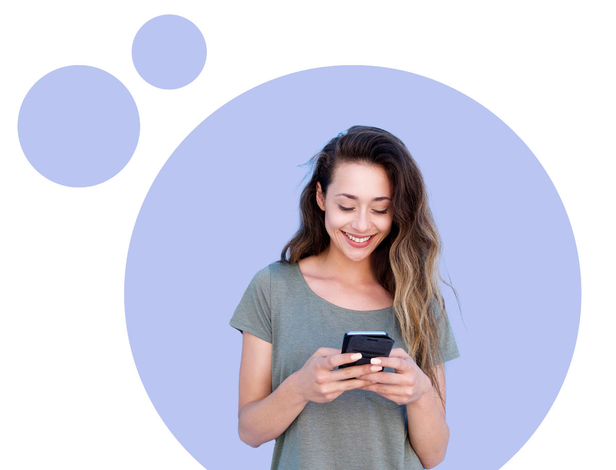 Woman smiling at her phone